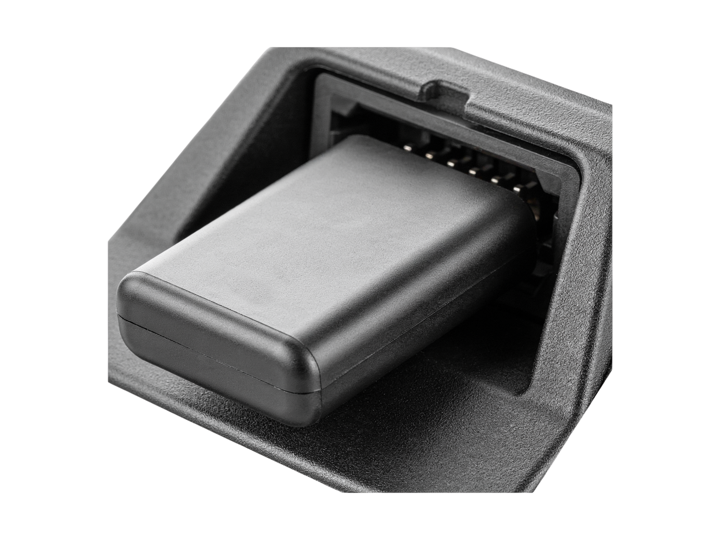Bluetooth OBD2 adapter plugged into a car diagnostic port